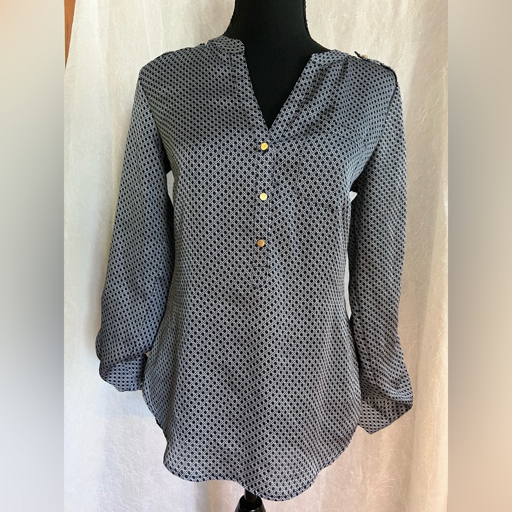 The limited blue satin top